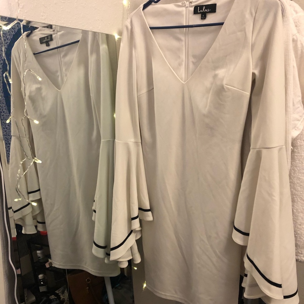 White flowy sleeved dress